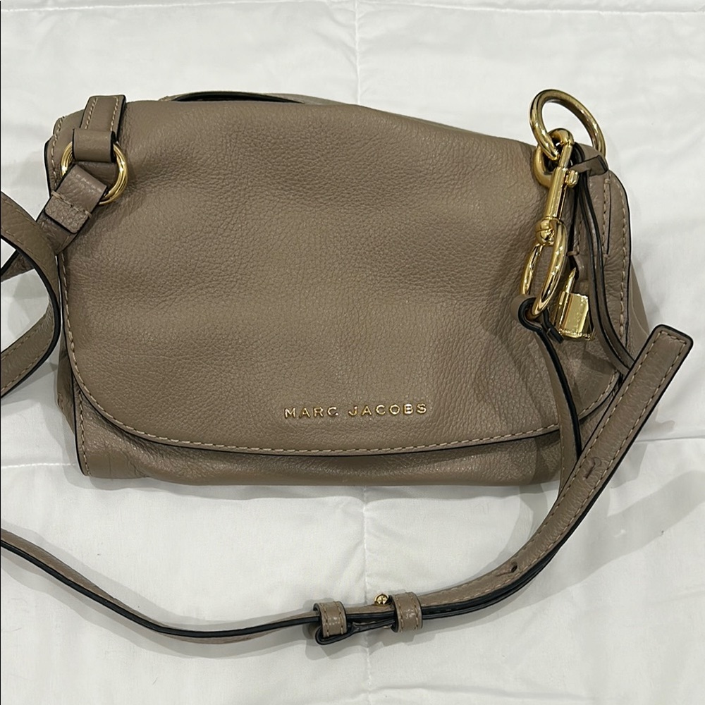 Great condition Marc Jacobs taupe cross body convertible bag.